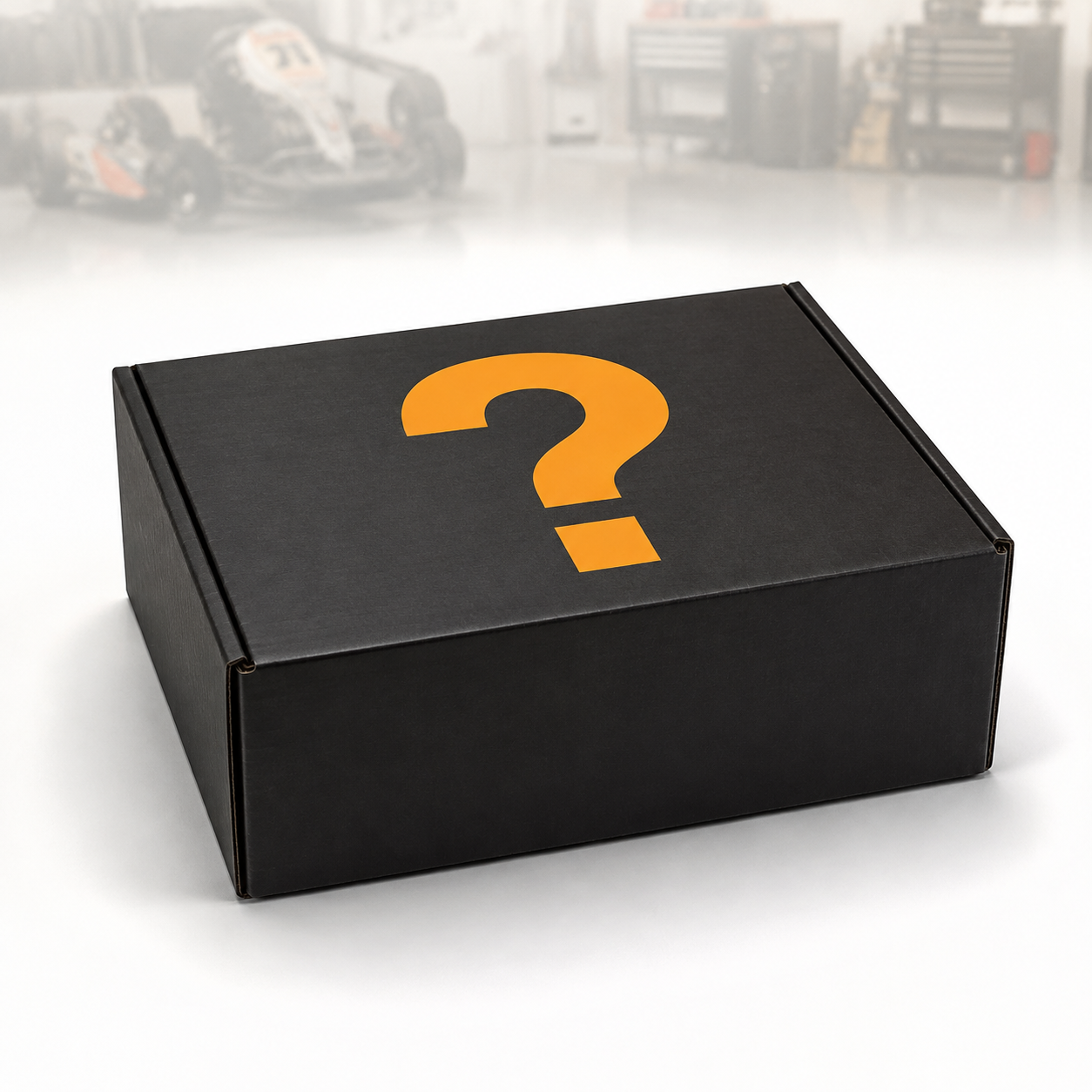 Sealed black kart parts mystery box with orange question mark